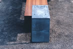 Bench with stone cube  detail  end view